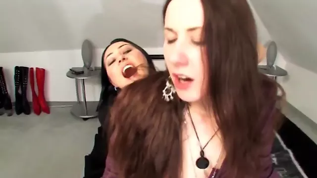 One kinky girl strap-on fucks the other one in lesbian video