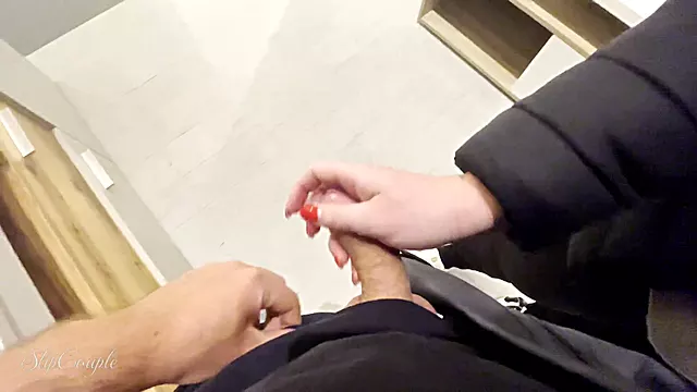 Risky public hand job in a furniture store ends in a kinky cum explosion