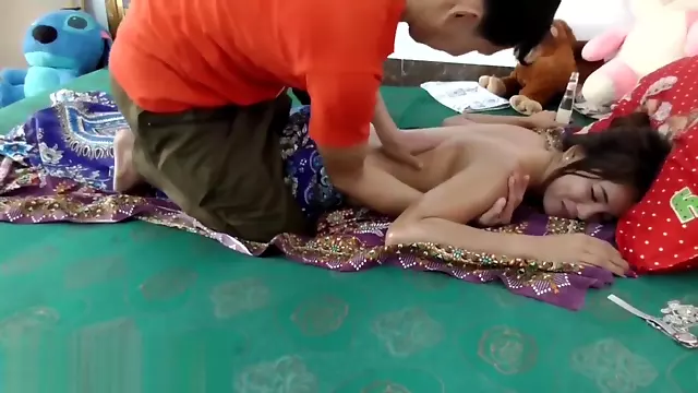 Traditional massage in the bedroom
