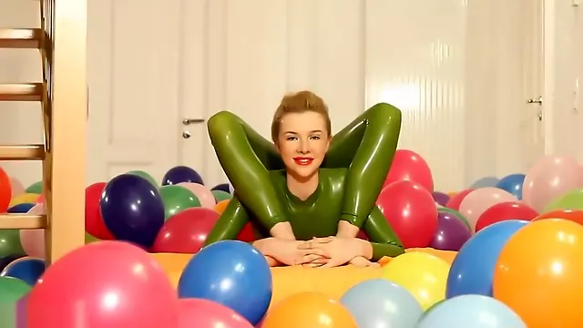 Flexy Sexy Green Rubber Catsuit Blonde Bare Feet & Bendy Positions