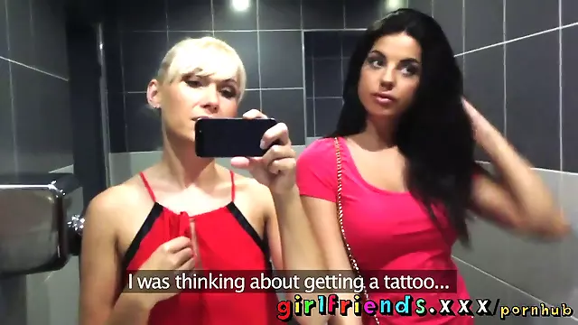 Watch these hot babes use their iPhones in public bathroom before getting steamy in the shower