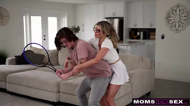 Cory Chase, the blonde stepmom in glasses, asks her stepson to stroke his tennis racquet better than a tennis court