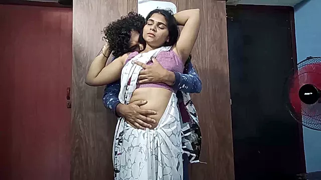 Vaishnavy and Sharun Raj intense saree love part 2, Neck smooch affection with passionate kissing and breast squeeze, Mallu pair steamy breasts fondling