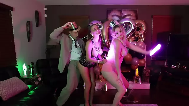 Two girls are sharing a hard cock at the birthday party